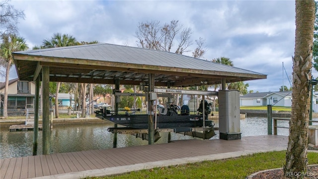 dock area featuring a water view