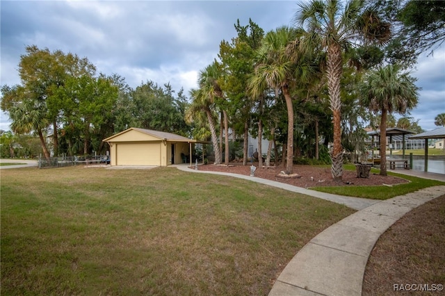 view of yard featuring a garage