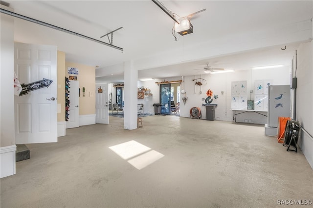 garage with ceiling fan and a garage door opener