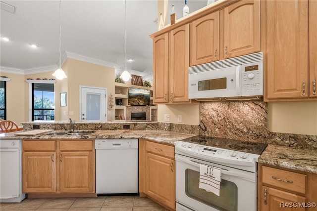 kitchen featuring white appliances, sink, light stone countertops, ornamental molding, and decorative light fixtures