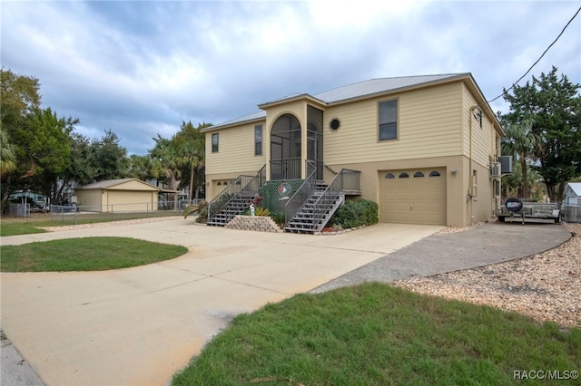 view of front of property featuring a garage