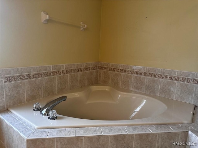 bathroom featuring a garden tub