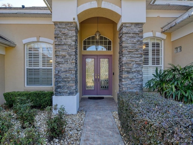 doorway to property featuring french doors