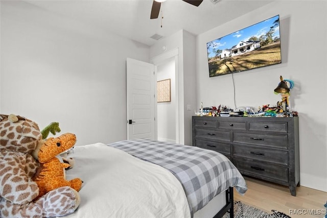 bedroom featuring ceiling fan and light wood-type flooring