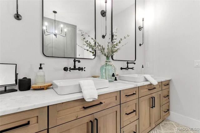 bathroom with vanity and tile patterned floors