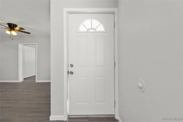 foyer entrance featuring dark hardwood / wood-style floors and ceiling fan