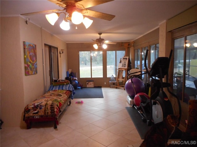 bedroom with ceiling fan, ornamental molding, and light tile patterned floors