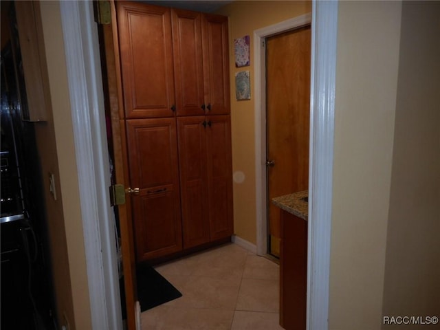 bathroom featuring tile patterned flooring