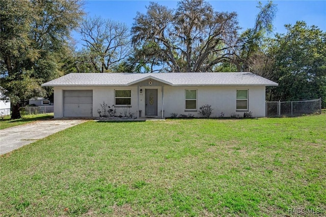 single story home featuring a front lawn, concrete driveway, fence, and an attached garage