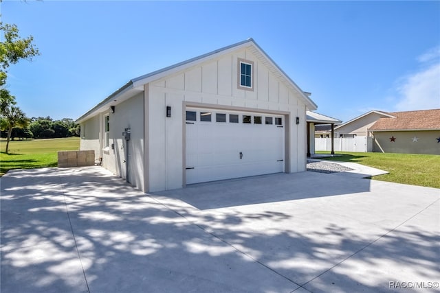 garage with a lawn