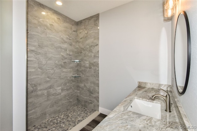 bathroom featuring vanity and hardwood / wood-style flooring