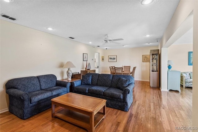 839 N Foxrun Ter, Inverness, FL 34453 - living area featuring ceiling fan, light wood finished floors, and recessed lighting