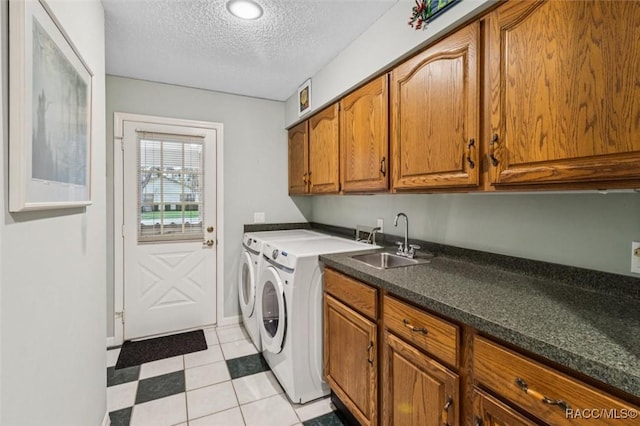 839 N Foxrun Ter, Inverness, FL 34453 - laundry room featuring cabinet space, washing machine and clothes dryer, a textured ceiling, and light tile patterned flooring