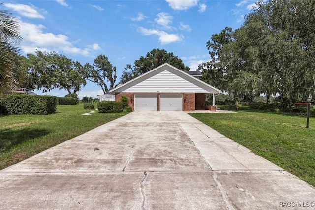 839 N Foxrun Ter, Inverness, FL 34453 - view of front facade with a front lawn, brick siding, driveway, and an attached garage