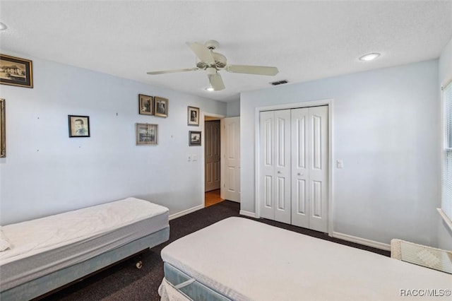 839 N Foxrun Ter, Inverness, FL 34453 - bedroom with a closet, dark carpet, ceiling fan, and recessed lighting