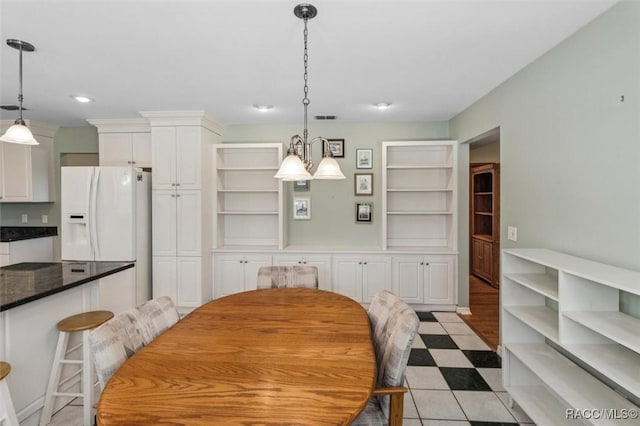 839 N Foxrun Ter, Inverness, FL 34453 - dining space featuring recessed lighting, built in shelves, and a chandelier