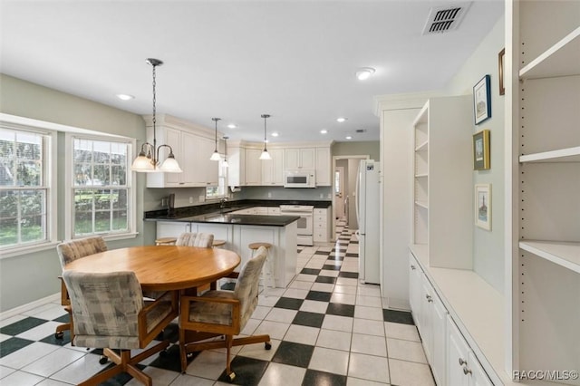 839 N Foxrun Ter, Inverness, FL 34453 - dining room with recessed lighting and baseboards