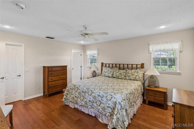 839 N Foxrun Ter, Inverness, FL 34453 - bedroom with wood finished floors, a textured ceiling, ceiling fan, and recessed lighting