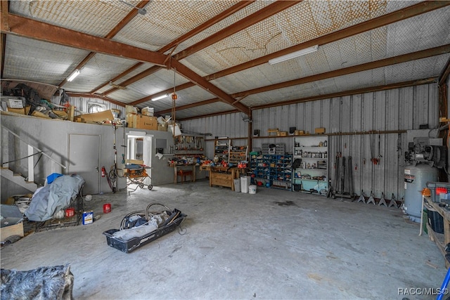 garage with a workshop area