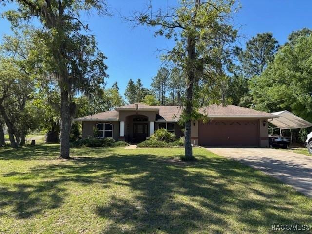 ranch-style home with a garage, a front yard, stucco siding, and concrete driveway