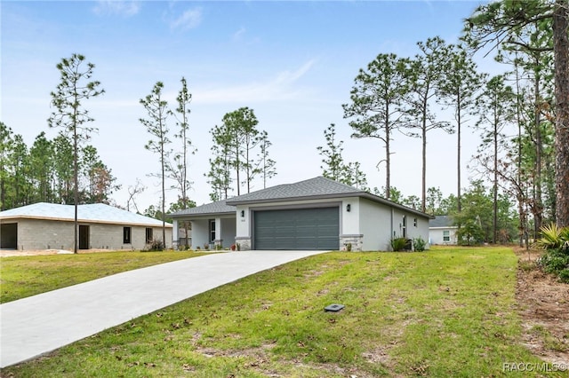 ranch-style home with a front lawn and a garage