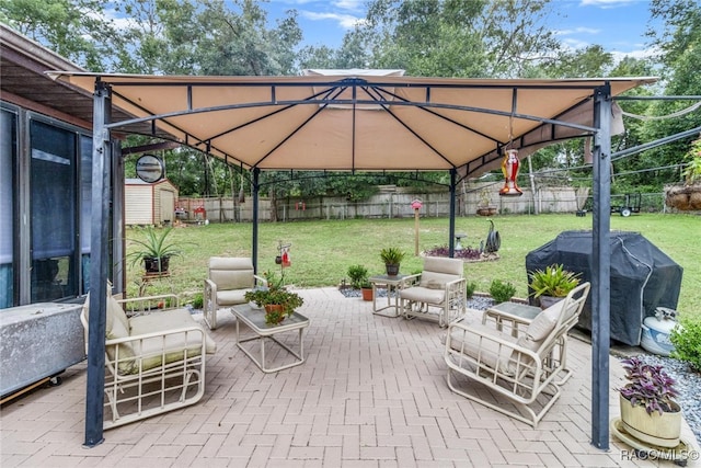 view of patio with a gazebo and area for grilling