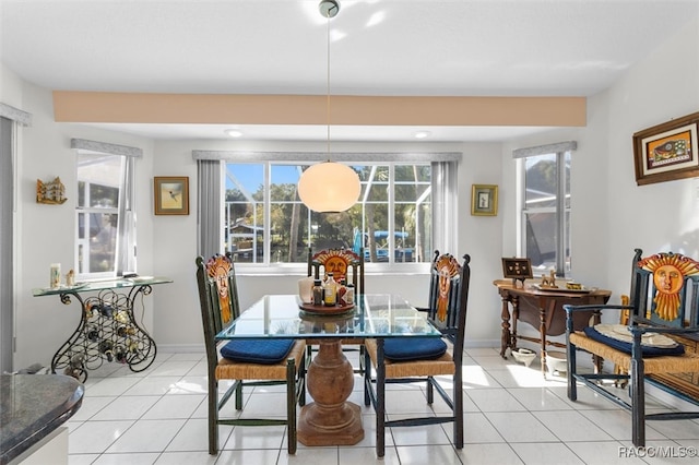 dining area with light tile patterned flooring