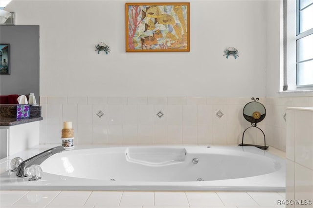 bathroom featuring tiled tub