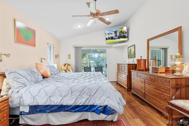 bedroom with access to outside, ceiling fan, wood-type flooring, and lofted ceiling