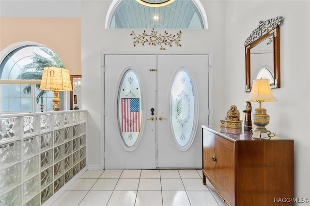 tiled entryway with french doors