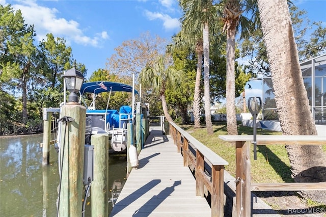 dock area featuring a water view