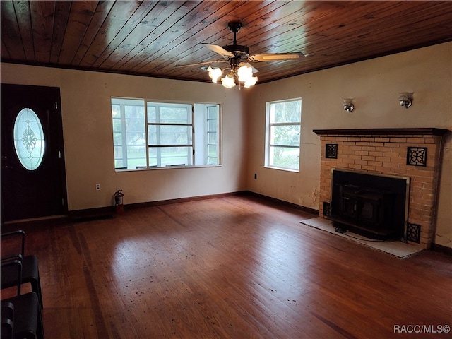 unfurnished living room featuring ceiling fan, wood ceiling, and hardwood / wood-style flooring