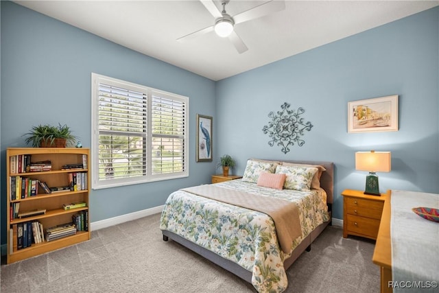 bedroom with carpet, baseboards, and ceiling fan