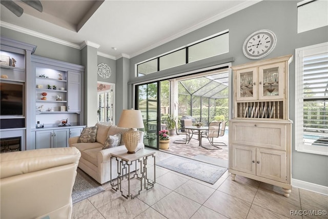 living room with crown molding, light tile patterned floors, baseboards, and a towering ceiling