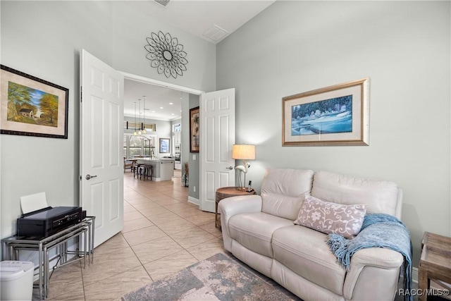 living area featuring high vaulted ceiling