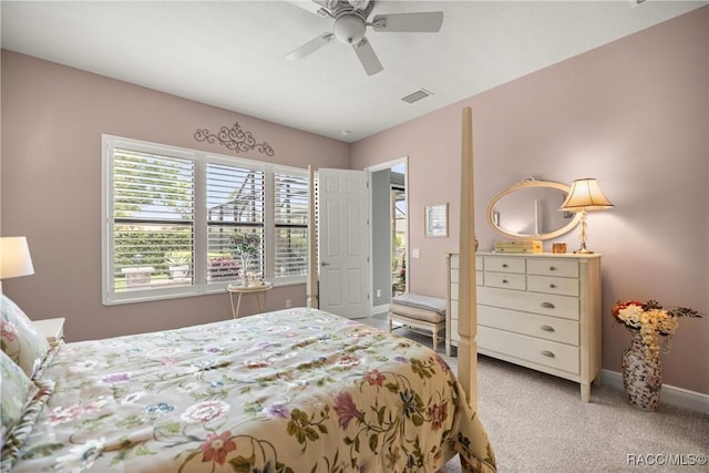bedroom featuring visible vents, baseboards, ceiling fan, and carpet