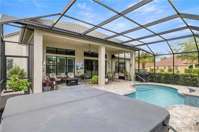 outdoor pool featuring a grill, a ceiling fan, an outdoor living space, glass enclosure, and a patio
