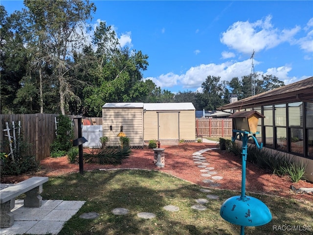 view of yard with a shed