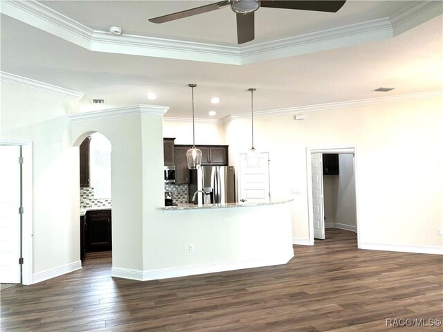 kitchen with stainless steel fridge with ice dispenser and light hardwood / wood-style floors