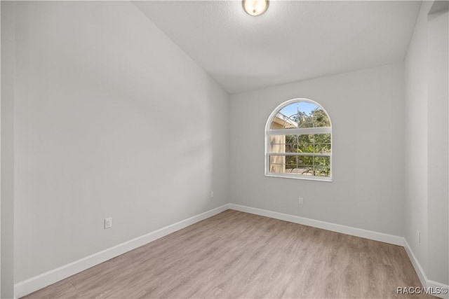 unfurnished room featuring light wood-type flooring