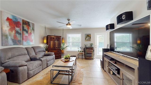 tiled living room featuring ceiling fan