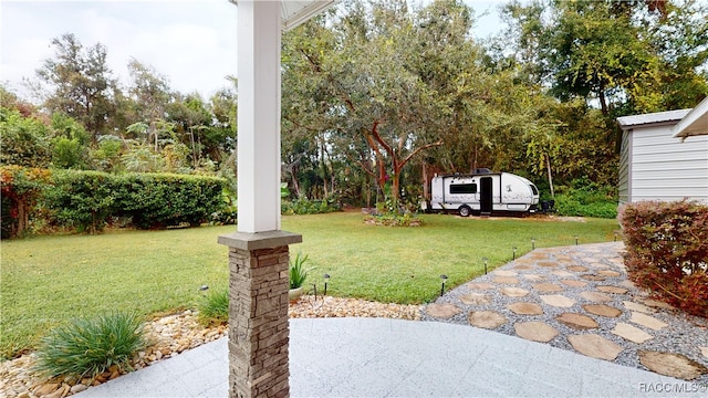 view of yard with a patio area