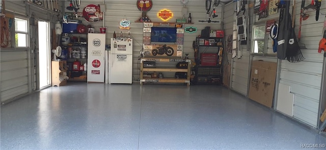 garage featuring white refrigerator