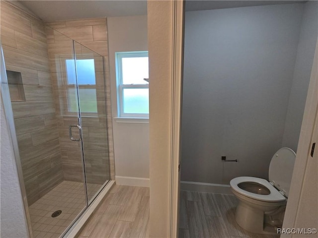 4953 N Triple Eagle Path, Beverly Hills, FL 34465 - full bathroom with a stall shower and wood finished floors