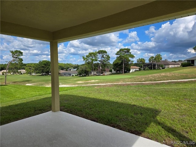 4953 N Triple Eagle Path, Beverly Hills, FL 34465 - view of green lawn featuring a residential view and a patio