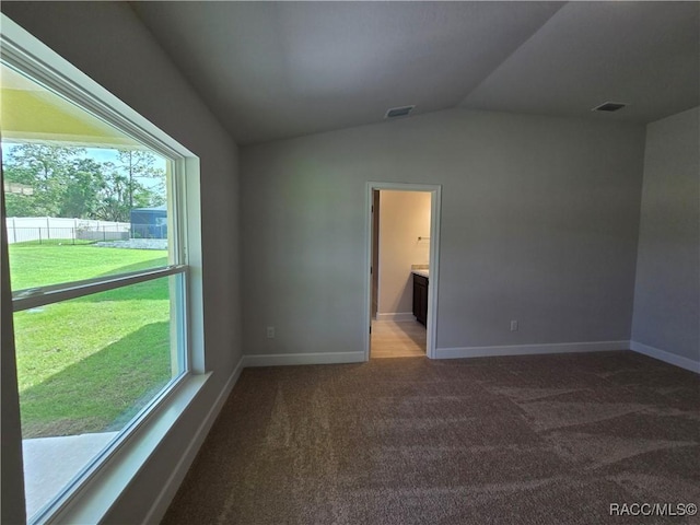 4953 N Triple Eagle Path, Beverly Hills, FL 34465 - spare room with light carpet and vaulted ceiling