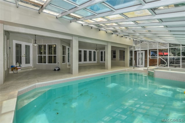 view of pool featuring french doors and a patio