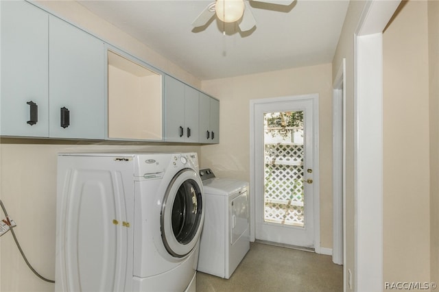 clothes washing area featuring washing machine and clothes dryer, ceiling fan, and cabinets