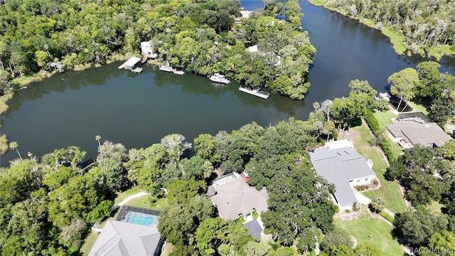 birds eye view of property featuring a water view