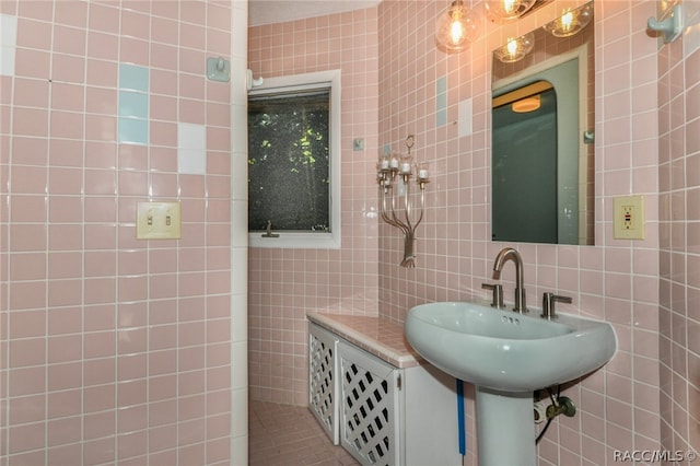 bathroom with decorative backsplash and tile walls